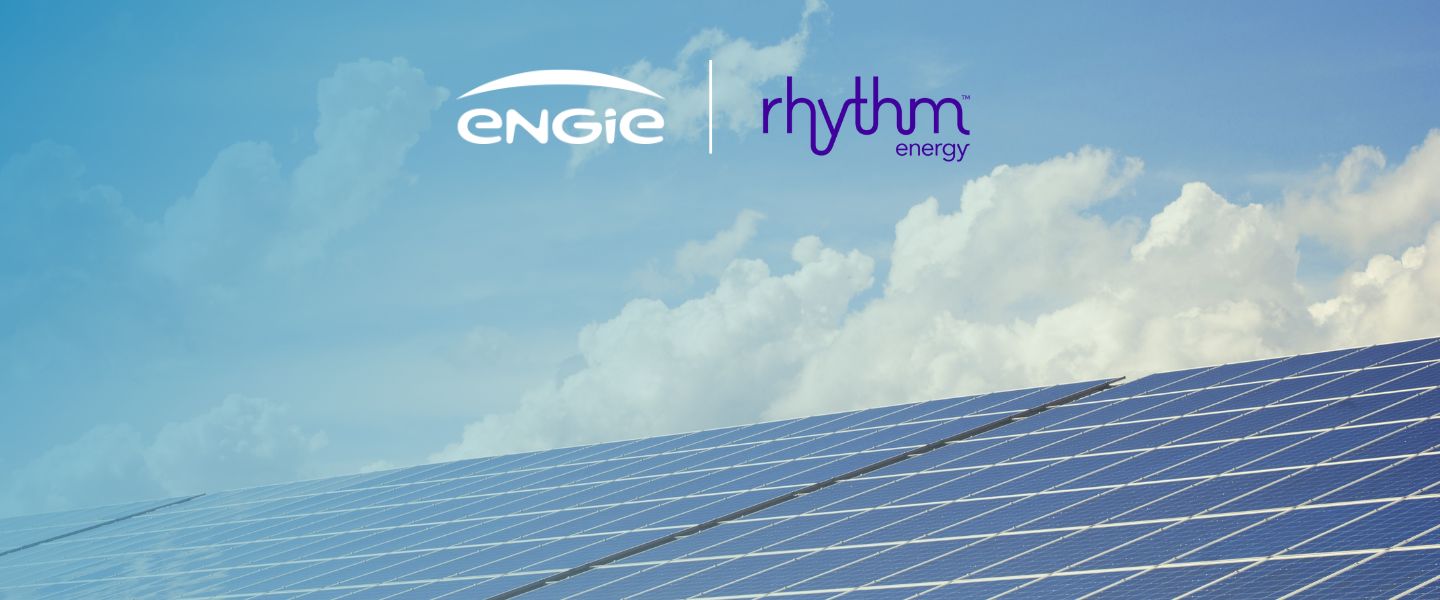 Solar panels with a blue sky. It also includes the ENGIE and Rhythm logos.