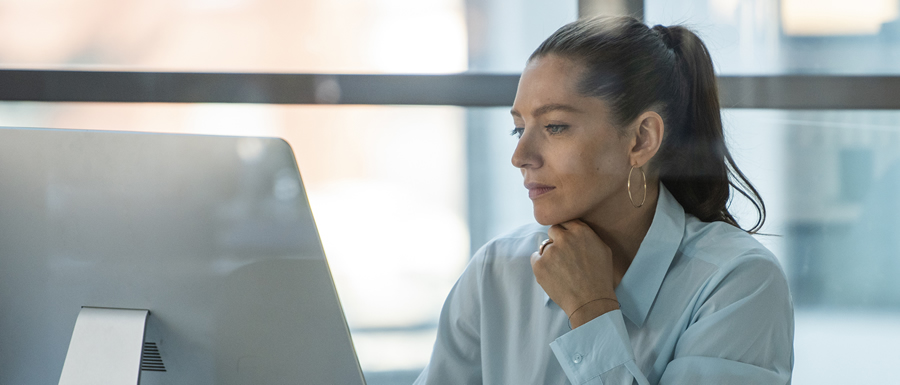 Woman Working on Computer in Office